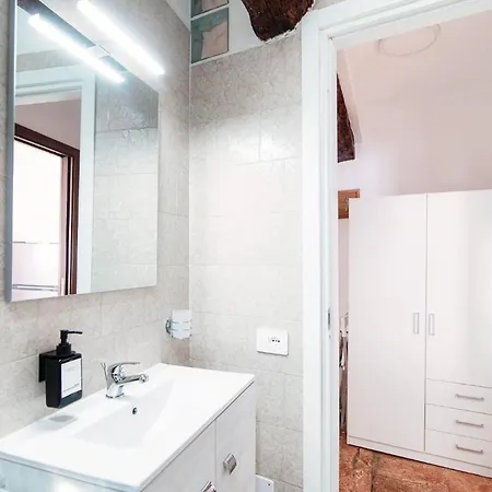 Apartman Design With Historic Beams Cotto Lombardo